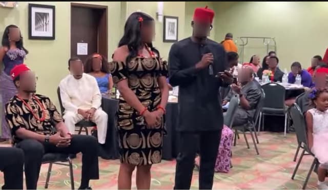 Two people sharing remarks